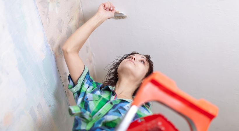 A woman making cosmetic repairs