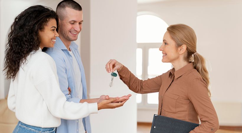 Estate agent selling house
